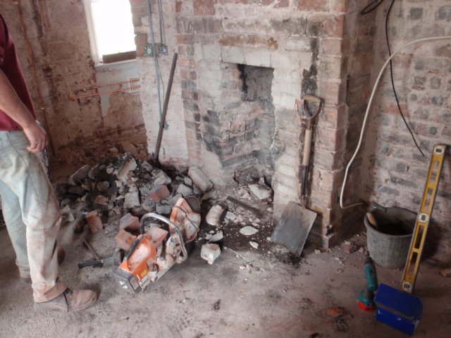 knockingouttheoldfireplace.jpg