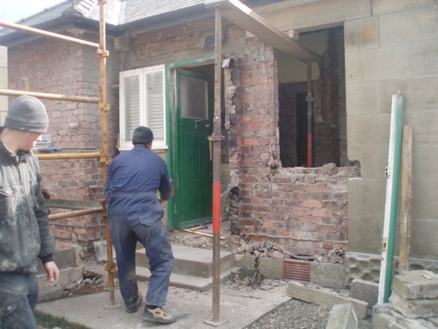 removingoldbackdoorandwindow.jpg